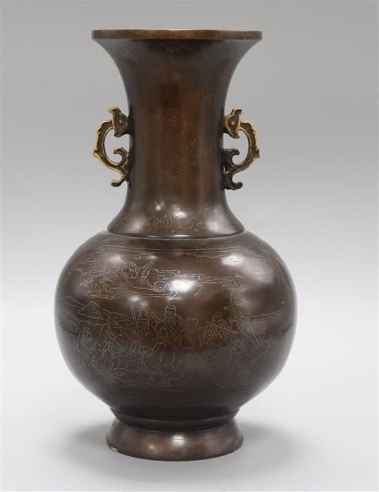 A Chinese bronze vase with silver inlay height 30.5cm
